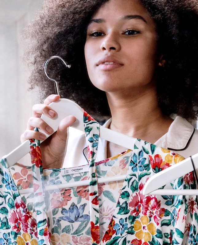 Woman Looking at Clothes