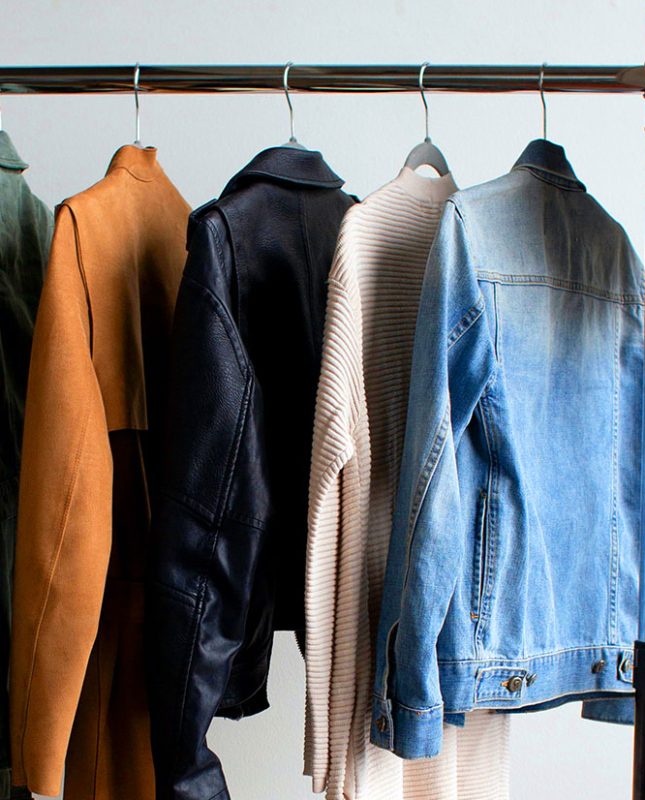 Clothes Hanging on Rail